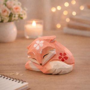 Hand Carved Sleeping Fox Wooden Figurine - Image 1